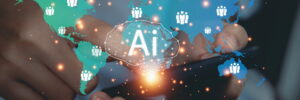 Image depicts the use of AI in recruiting as a close-up of a person’s hands holding a horizontal image of the globe.